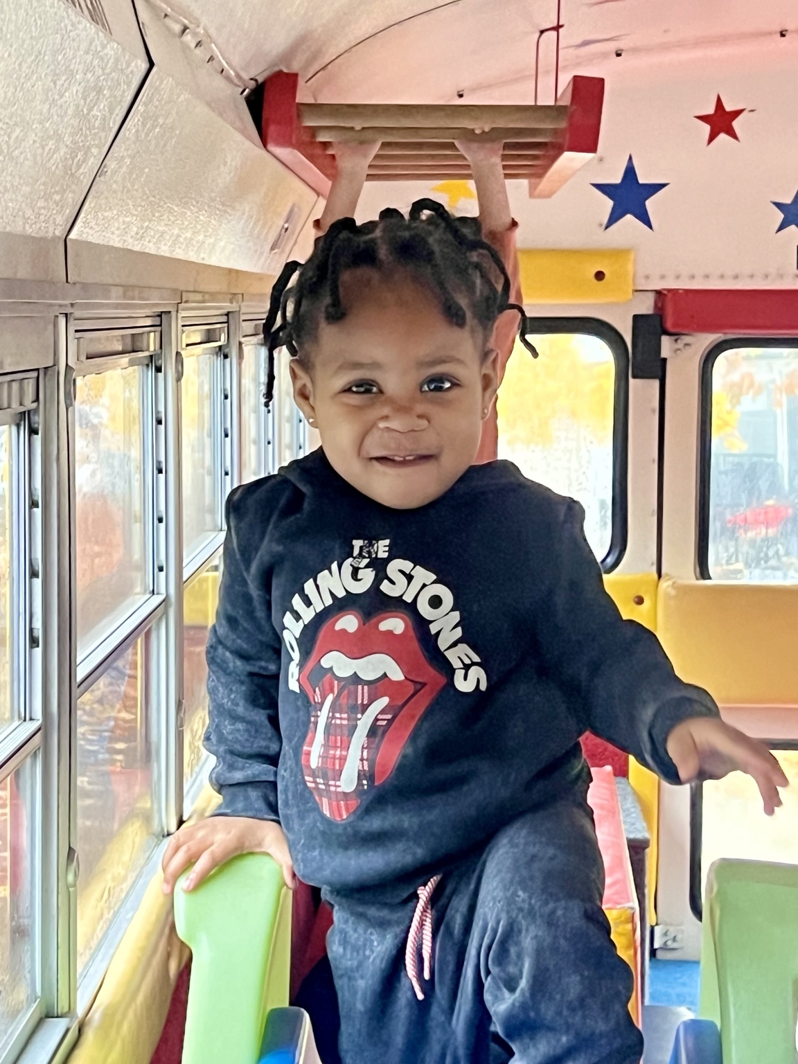 A child climbing inside the Tumblebus